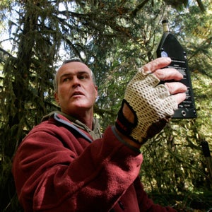 ** ADVANCE FOR WEEKEND, OCT. 28-29 **Acoustic ecologist Gordon Hempton uses a sound level meter as he stands on the Hoh River Trail,  Oct. 2, 2006, in the Hoh Rain Forest of Olympic National Park, Wash. Hempton's hope is that by protecting one square inch in the rain forest from man-made sound, a much larger part of the park will reap the benefits. (AP Photo/Elaine Thompson)