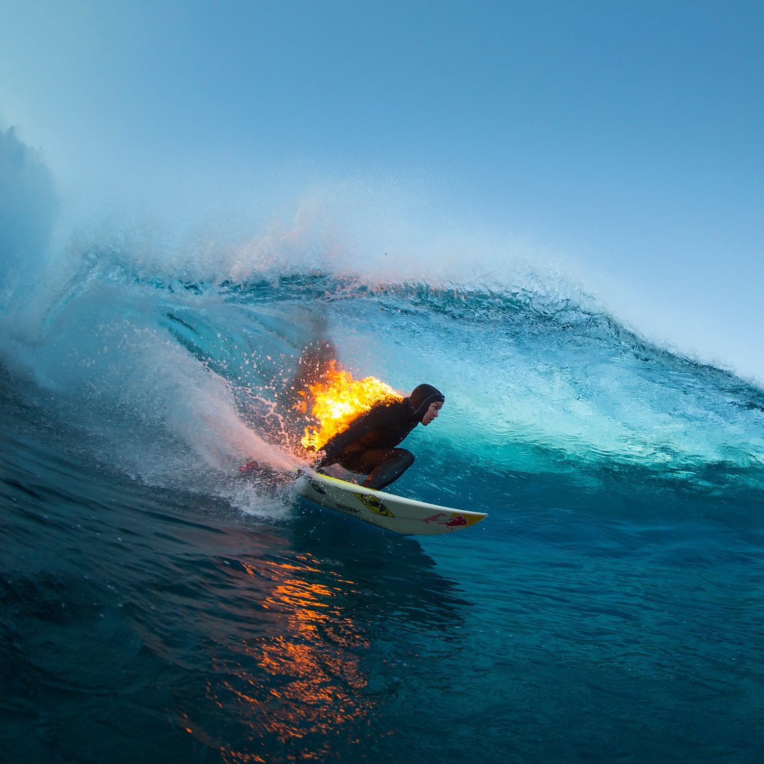 Jamie O'Brien surfs whilst lit on fire, at Teahupoo, Tahiti on 21 July, 2015.