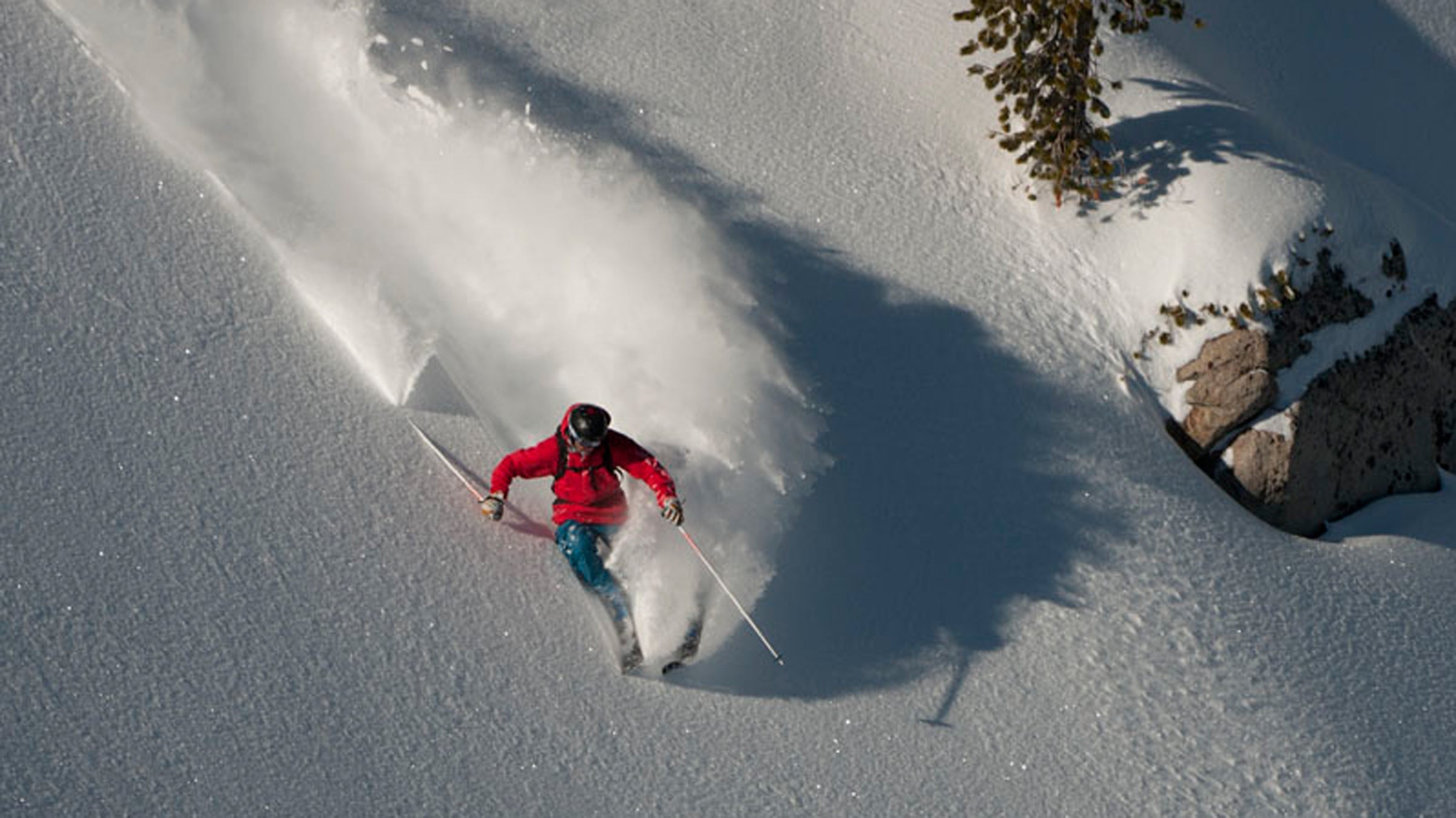 As an elite BASE jumper and big-mountain skier, JT Holmes is known for filming footage for extreme sports videos.