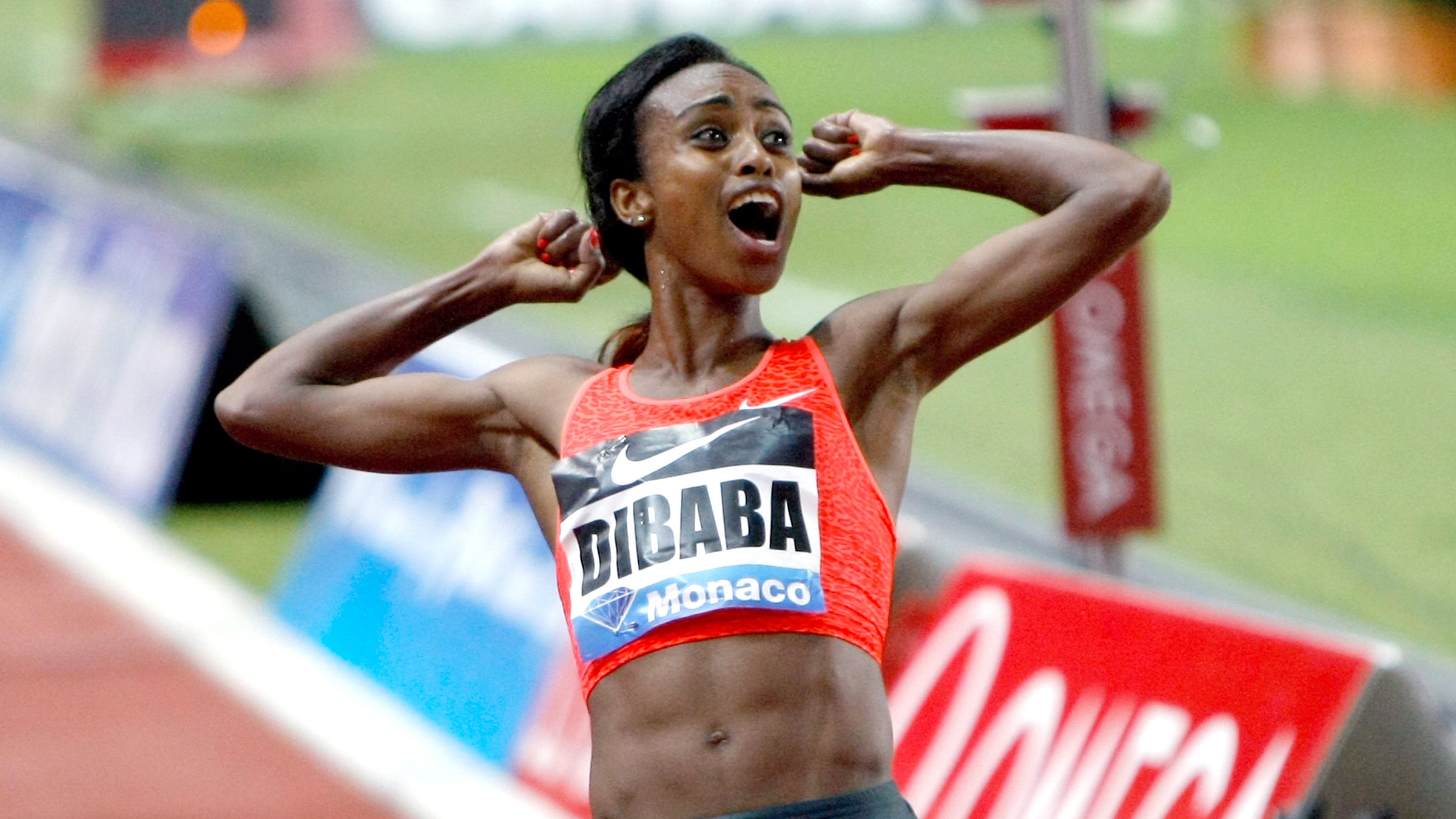 Ethiopia's Genzebe Dibaba after winning the 1500m women's race and setting a new world record at the Herculis International Athletics Meeting.