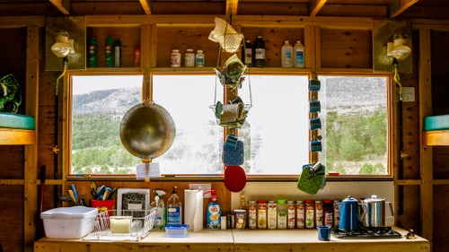 Dry Creek Basin Hut, on day three, looks out on the southwestern Colorado mesa. Every hut's stovetop view makes getting involved with dinner prep worth it. From a giant wok to Ginsu knives, pretty much everything you need to cook is here. If you鈥檙e lucky, you鈥檒l end up sharing a hut with a backcountry chef.
