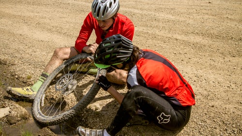 Bring tools (patch kit, extra tubes, chain breaker, multi-tool) and know how to use them. You won't be passing bike shops and fellow riders with mechanic skills will be scarce and possibly unhelpful. Fortunately, a flat on day three was the worst mechanical problem we encountered.