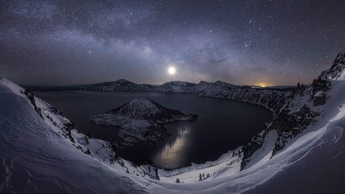 Taking third place in the Beauty of Night Sky category, this photograph by Portland-based photographer Ben Coffman captures a wide-angle view of Crater Lake National Park with a crescent moon overhead and the sun beginning to rise on a clear morning in February 2015.