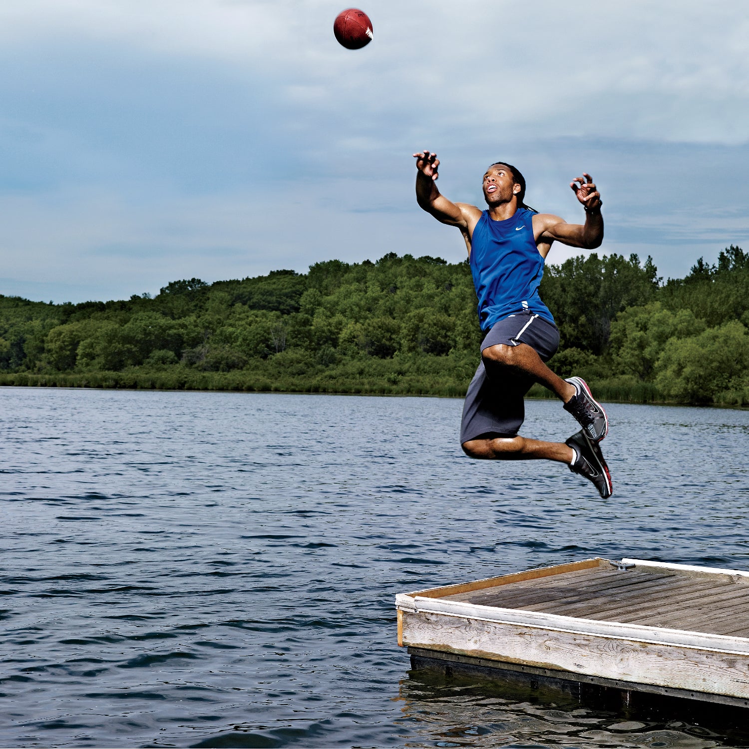 Larry Fitzgerald Goes for the Leaping Catch. Editorial Photography