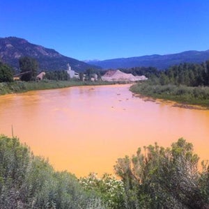 Heavy metals, including iron and copper, poured into the Animas River, turning it bright orange.