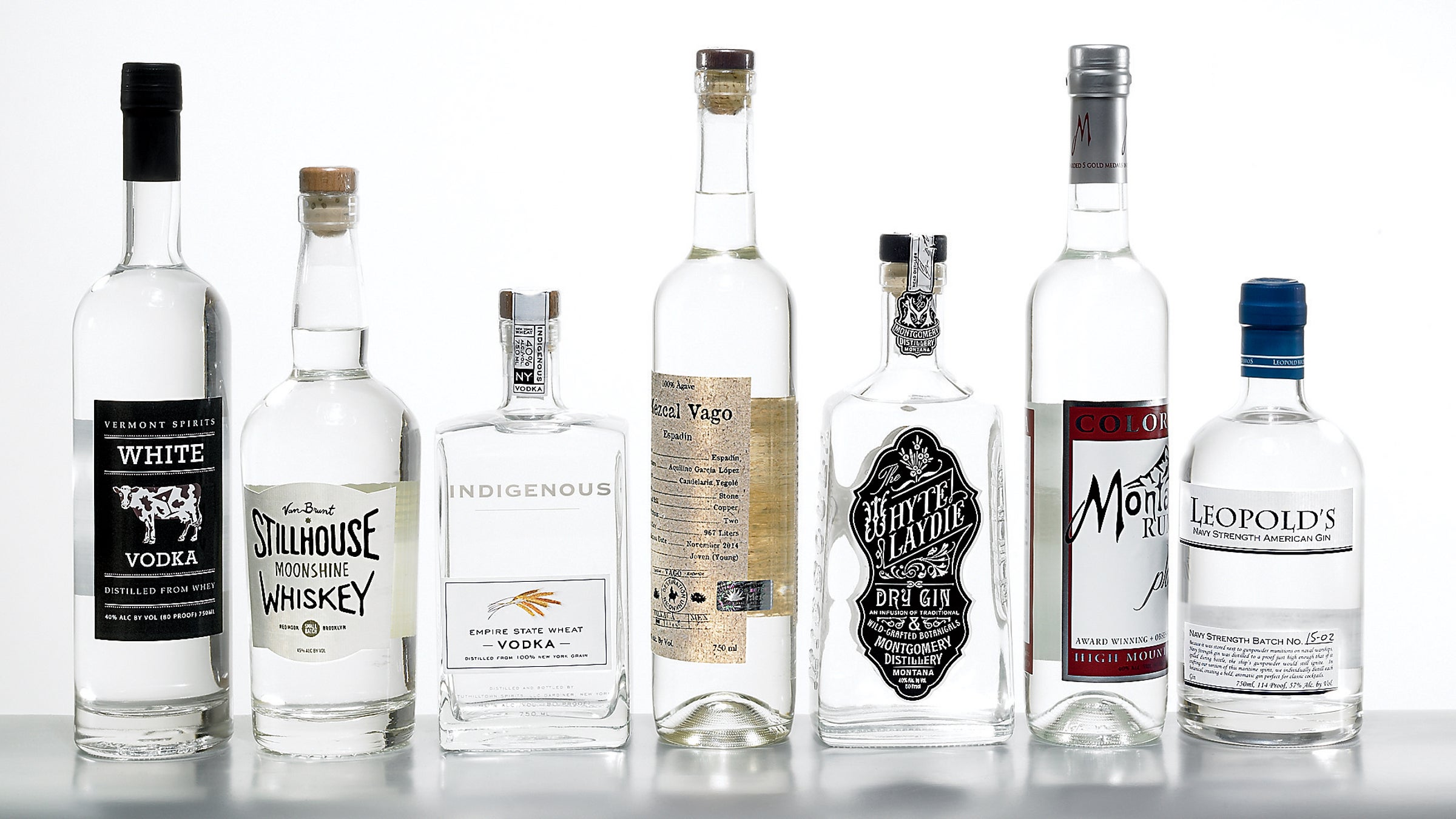 From left: Vermont Spirits White Vodka, Van Brunt Stillhouse Moonshine Whiskey, Tuthilltown Spirits Indigenous Empire State Wheat Vodka, Mezcal Vago Espadin, Montgomery Distillery Whyte Laydie Dry Gin, Montanya Distillers Platino Light Rum, and Leopold’s Navy Strength American Gin.