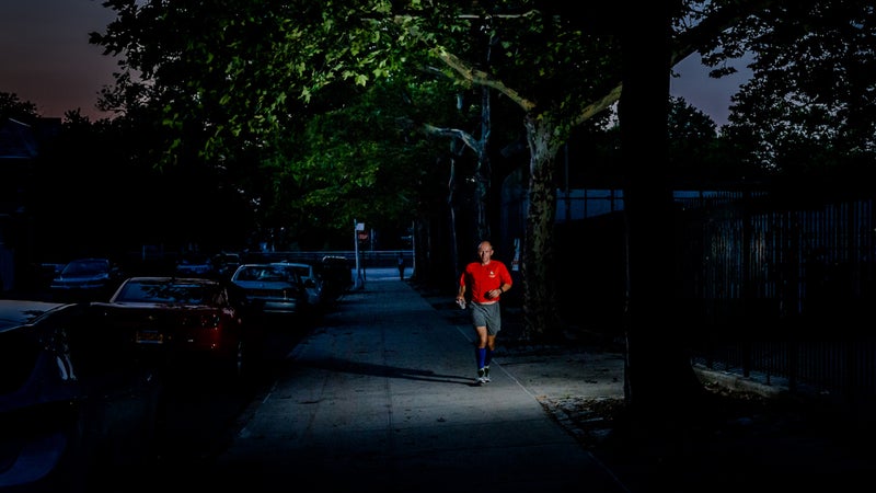 Runners completed 5,649 half-mile loops around a block in Queens, New York, to reach 3,100 miles.