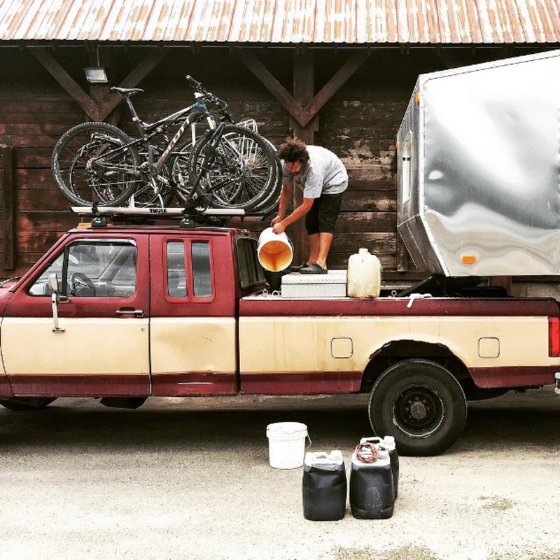 @livesmallridefree: This is what refueling looks like for us. We pre-filtered all the waste veggie oil that we got while in Montana and pulled into a small town in Washington to fill up our empty WVO tank with the extra grease we carried. We drove from Missoula to Seattle all on grease.