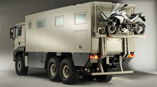 This 18-ton, off-road luxury camper comes with a motorcycle lift.