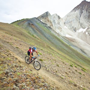 Karoline Droege descends some steep switchbacks while mountain biking on the Chamberlain Trail to the top of the 10,000 foot Castle Divide in the White Cloud Mountains in Idaho.