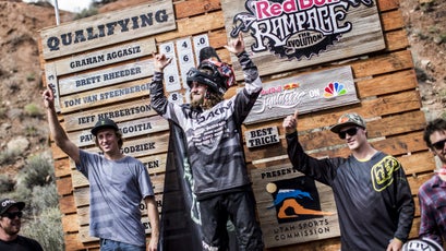 Graham Agassiz celebrates his victory as a top qualifier at the 2014 Red Bull Rampage.