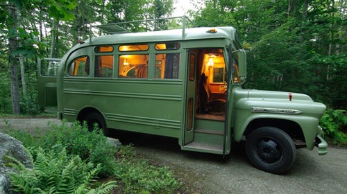The renovated bus features couches that seat 12, plus a toilet and sink.