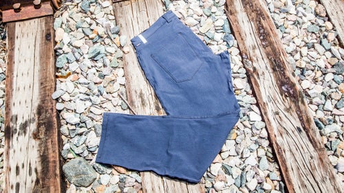 Commuter trousers have all the warmth and functionality of bike jeans, but are a bit dressier for morning meetings. I’m a fan of the Durable Cotton Slim trousers because they fit well (svelte but articulated for movement), plus they can take a beating, thanks to an extra-thick cotton-nylon blend throughout. Clever details include: a back hem that’s cut slightly higher than the front to fight plumber’s crack, reflective hits on the belt loops, and a rear pocket big enough to fit a U-lock.