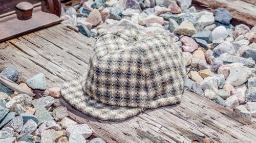 You’ll notice the pro peloton wearing cycling caps under their helmets on cold days to keep their noggins warm. Same concept here. This cycling cap is handmade from wool sourced in the British Isles, and while it won’t protect your ears, it’s thick enough to take the bite out of the wind.