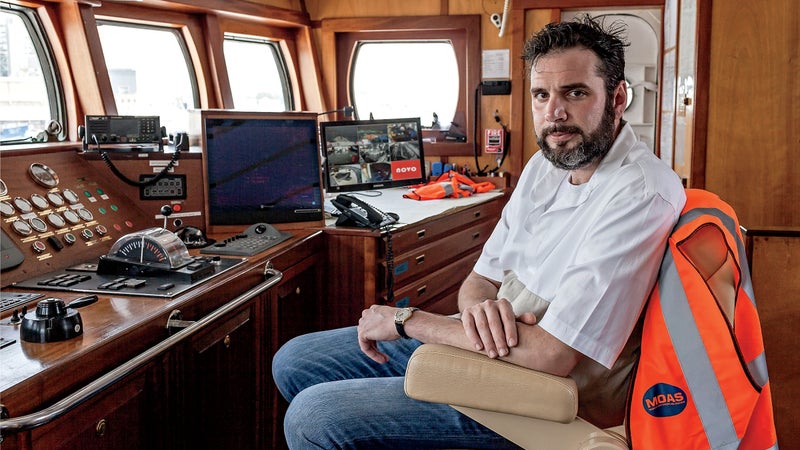 Christopher Catrambone on the bridge of the MV Phoenix.