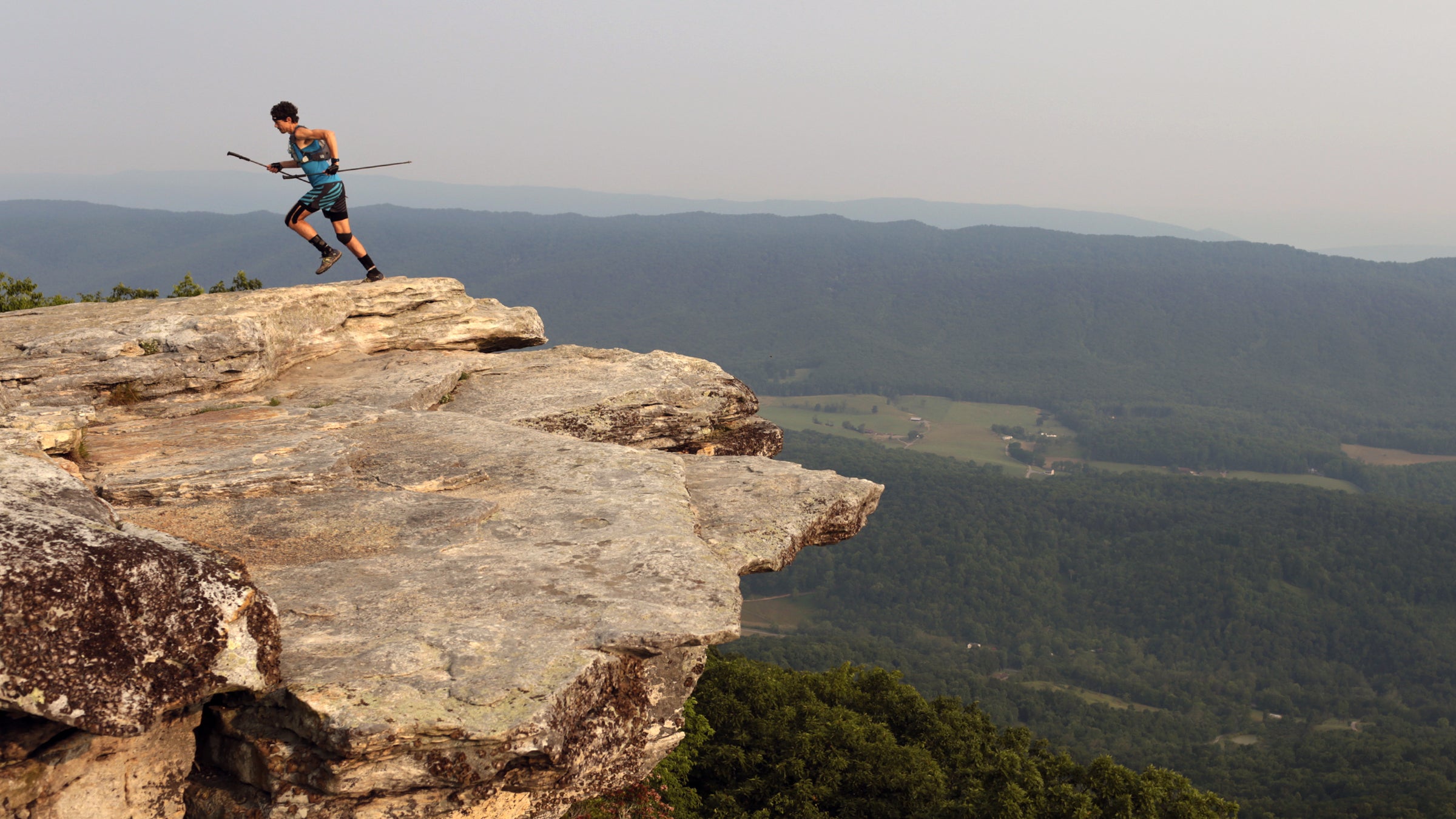 Scott Jurek jogs away from McAffee Knob overlook in Catawba, Virginia on June 11, 2015. 