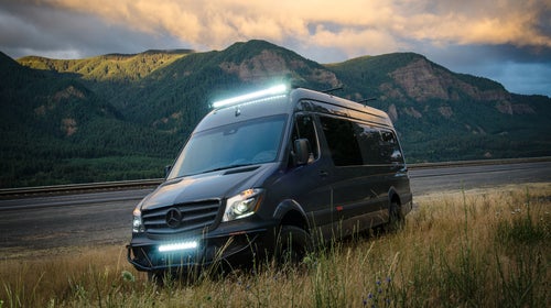 The Lava Flow van comes with LED lights and racks for mountain bikes, dirt bikes, SUPs, and more.