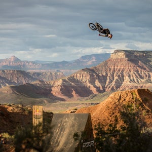 Andreu Lacondeguy high above the Rampage course in Virgin, Utah.