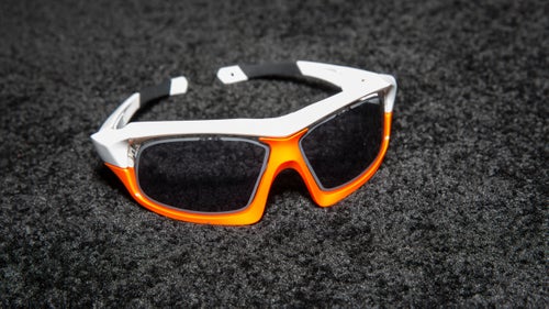 We've long been fans of Uvex light-sensitive Vario lenses, which adjust to the conditions to provide the right amount of shade for optimal vision. The only drawback to the photochromic technology has been a slow transition from dark to light, which can make high-contrast riding difficult. Uvex has cracked that problem with a new LCD lens that can toggle instantaneously between dark and light.
Read more about Uvex Variotronic S Sunglasses.