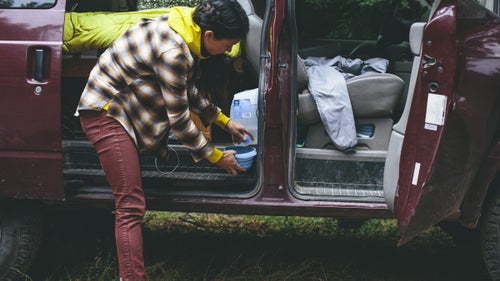 Fun Facts: The Astrovan has a small lift, which allows the couple to treat the rig like a truck and get some places other vans can鈥檛. They cook outside on a collapsable table and chairs, use a cooler to keep food fresh, and park it wherever they feel comfortable.