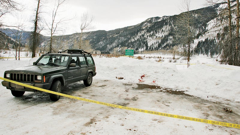 Blanning's Cherokee at the spot where police found his body.