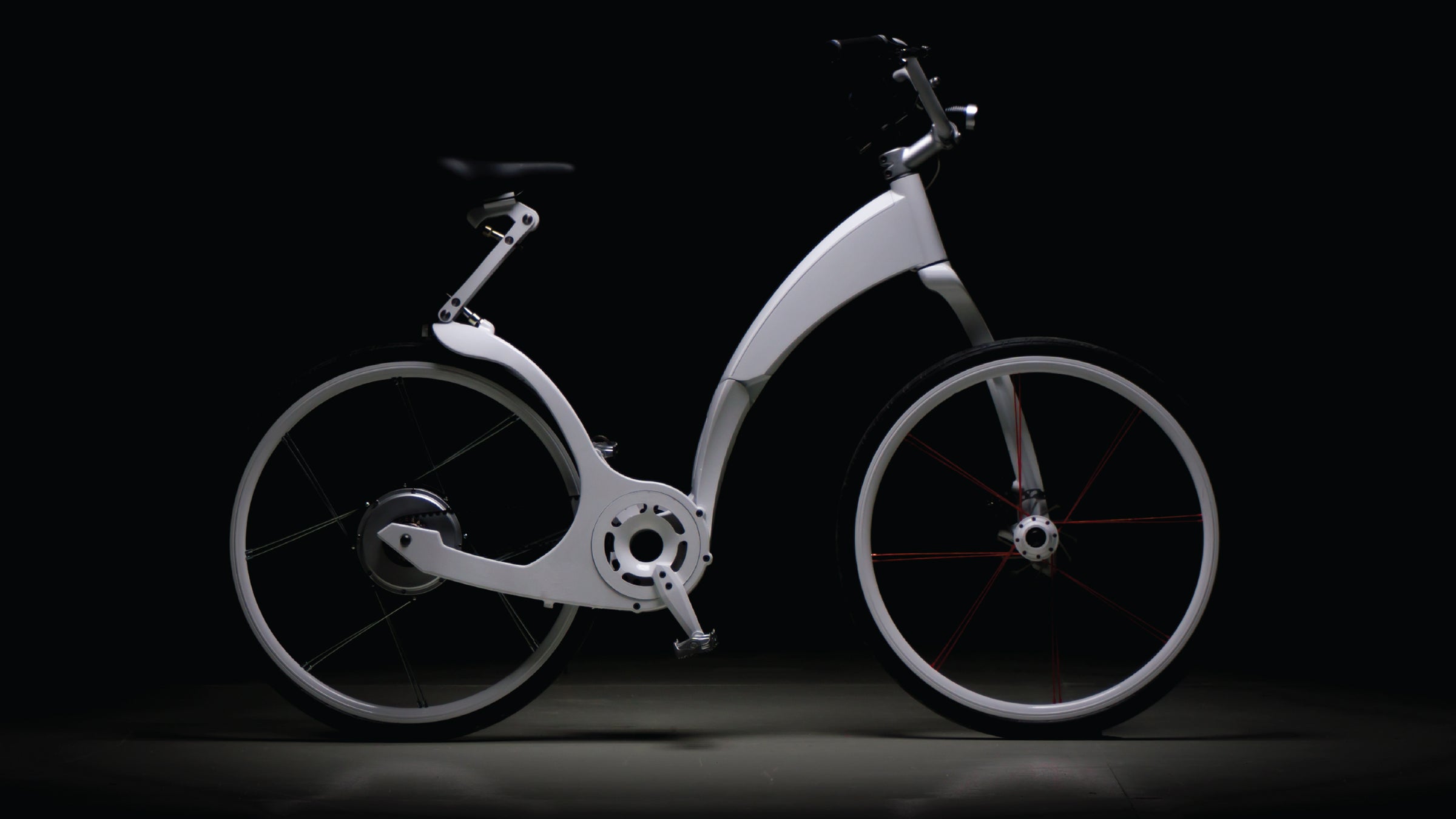 The Gi FlyBike folds in half in one second, and comes with motor assist.