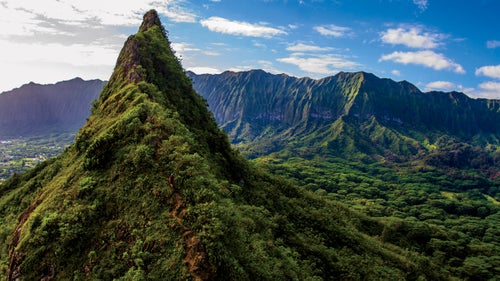 In 2014, Moss, who lives in San Jose, California, overcame his fear of heights while solo-hiking the two-foot-wide paths of Hawaii鈥檚 Koolau Range in five days鈥攔ecord time. Last February, he captured his friend Hunter Williams summiting the steepest peak of the nearby Olomana Trail. 鈥淛ust as he reappeared, the clouds parted,鈥 Moss says. 鈥淪eeing him along that crumbly, dangerous ridge line reminded me of what I鈥檇 gone through and of everything I was doing as a mountaineer in Hawaii.
THE TOOLS: Canon EOS 7D, Tokina 10-17mm f/17 lens, ISO 100, f/5.6, 1/250 second