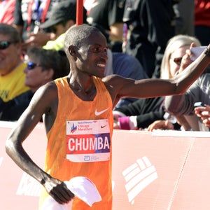 Dickson Chumba, of Kenya, celebrates after winning the 2015 Bank of America Chicago Marathon, Sunday, Oct. 11, 2015, in Chicago. (AP Photo/Paul Beaty)