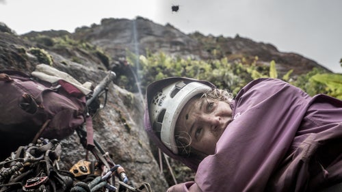 Payne dodging debris as Libecki clears the route for pitch five above. This became a far too familiar occurrence.