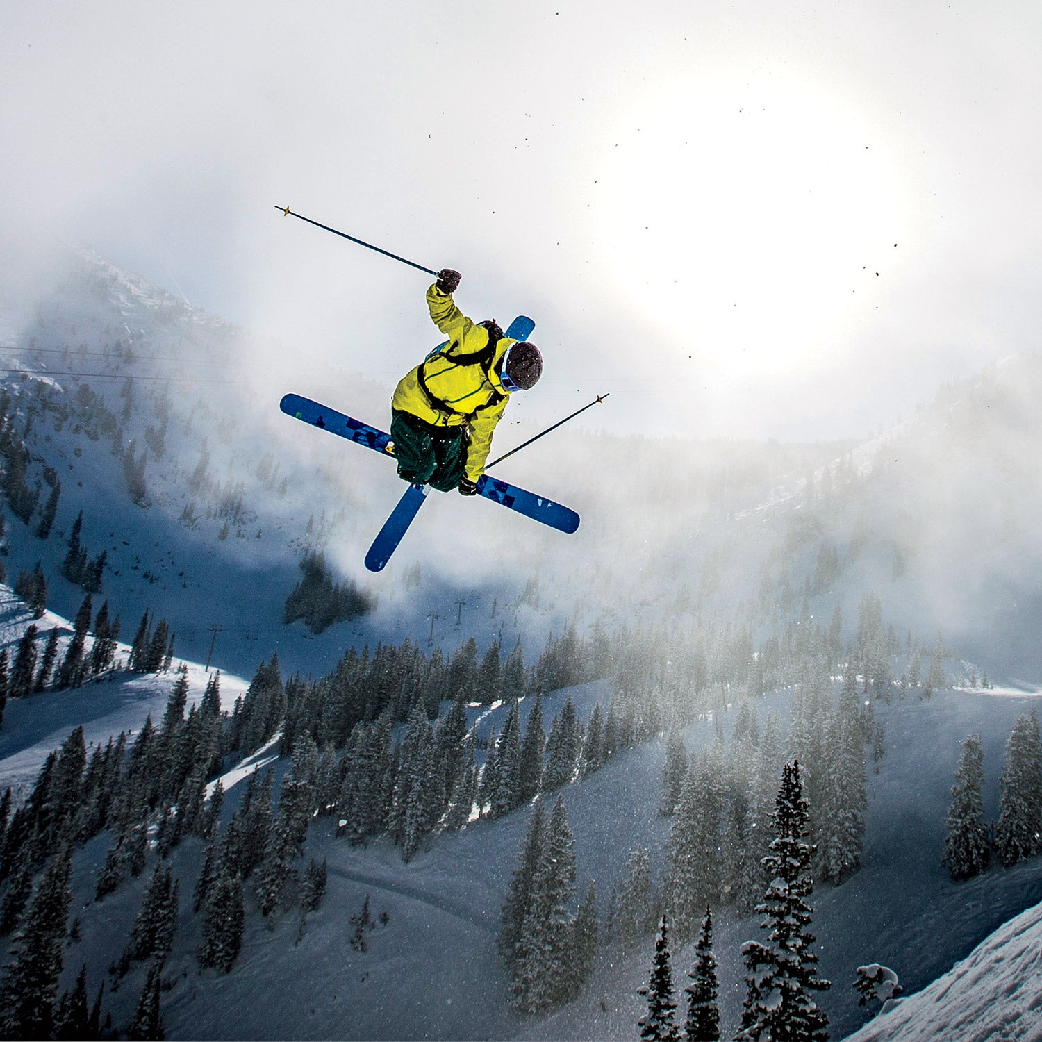 A man jumps off a cliff, Snowbird, Utah