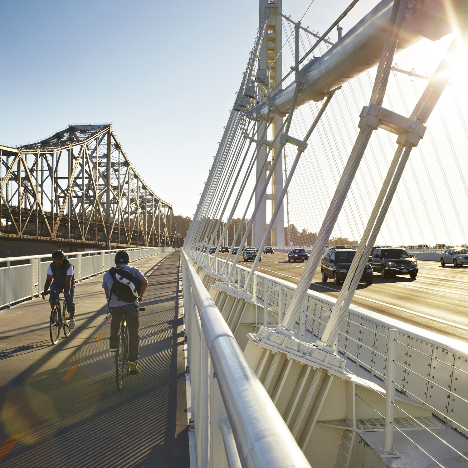 Commuters ride on the Bay Bridge bike path.