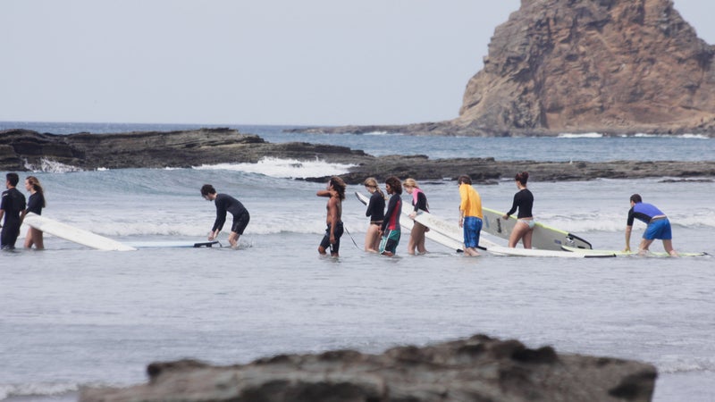 A group in San Juan del Sur, Nicaragua with coach Rex Calderon.