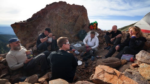 German climatologist Andreas Pflitsch (second from right) met McGregor (left) and Cartaya (third from right) at the International Workshop on Ice Caves in Idaho Falls. Though Pflitsch had never studied glacier caves, he was interested by the dramatic changes happening within the Sandy Glacier and agreed to visit in June. In the five days he was at the glacier, he went into the caves up to three times a day, measuring airflow and temperature.