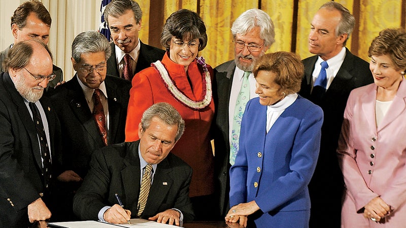 President George W. Bush establishing the 140,000-square-mile Northwestern Hawaiian Islands National Monument, which Earle helped inspire him to create, in June 2006.