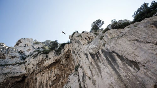 On the rocky shores of Cassis in southern France, the whole village has gathered and the excitement rises as Lionel Franc prepares to dive from 98 feet鈥攈is highest ever. After a few minutes of deep concentration, Franc steps forward, raises his arms and jumps into the void. Three seconds later, he enters the water at a speed of 60mph. His trainer and two lifeguards move in to make sure he is safe. He quickly emerges making the OK signal with his hands. At 45, Franc is one of the few cliff-divers in the world to enter the water head-first. Known around town as Loulou, Franc began diving as a boy and was trained by Jean-Michel Beaujon, who was a student of Father Simon, a famous cliff diver with the nickname 鈥渢he flying-priest.鈥 Franc is a father of three and follows an intense physical training plan, dives year round, and, by all accounts, has dedicated life to performing dives from such heights. Over the last year, French photographer Brice Portolano spent time with Franc in the calanques鈥攕teep-walled inlets of limestone in southern France鈥攁nd returned with a collection of incredible images. Here, Portolano shares a few of his favorites and a window into the cliff diver鈥檚 world.