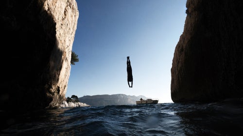 Stephane watches close by in a boat in case anything goes wrong.