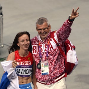 Coach Wladimir Kazarin with Russia's Mariya Savinova at the London 2012 Olympics Games.