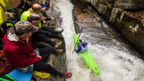 In the whitewater mecca of Asheville, North Carolina, the first Saturday of November belongs to the Green River Narrows Race. First established 20 years ago by a group of 16 hard-charging locals, the race has grown into one of the country鈥檚 most competitive and respected, with the biggest names in the sport returning year after year to battle it out. There鈥檚 no money on the line and no barrier to entry. But it鈥檚 been called the Super Bowl of Kayaking for good reason, packing a raucous audience atop the tight canyon walls of what locals call the bedrock coliseum. As photographer John Webster discovered, it鈥檚 also a damn good time. Photo: The three-quarter-mile-long course is notoriously brutal, taking paddlers through a chain of powerful class V rapids punctuated by a narrow 18-foot drop dubbed Gorilla. But it鈥檚 what happens out of the water that sets the Green race apart: whereas most backcountry whitewater competitions only draw a handful of spectators, the Green packs the crowd ten-deep, with spectators just feet from the the river, their cheers and hollers blasting off the tight canyon walls.