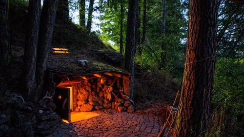 Joseph, Oregon: One of two underground structures on the Pacific Northwest property. Each hut is dug out from the hillside and supported by wood beams.