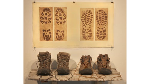 To create these prints of his Merrell and Scarpa boots, Rue stepped on a copper plate covered in an acid-resistant coating while wearing his hiking boots. He then dipped the plate in an acid bath, which ate away at everything around the boot imprint. After inking the engraved plate and running it through a press, Rue displayed these etchings with the actual boots, each of which has covered over 1,000 miles. 鈥淚n my most recent show I had my trekking poles and my sleeping bag,鈥 he says. 鈥淣othing has been retired yet except the boots, which have holes and smell bad.鈥