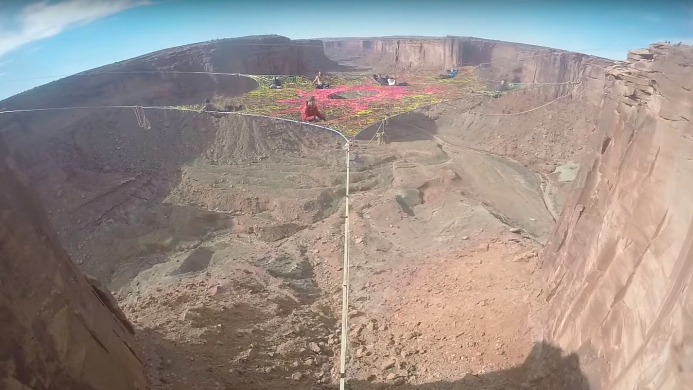 According to Lewis' YouTube description, more than 100 people helped build the two space nets, which used more than 21,000 feet of cord.