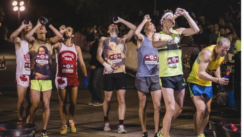 Kent (second from left) is the world's only professional beer-miler.