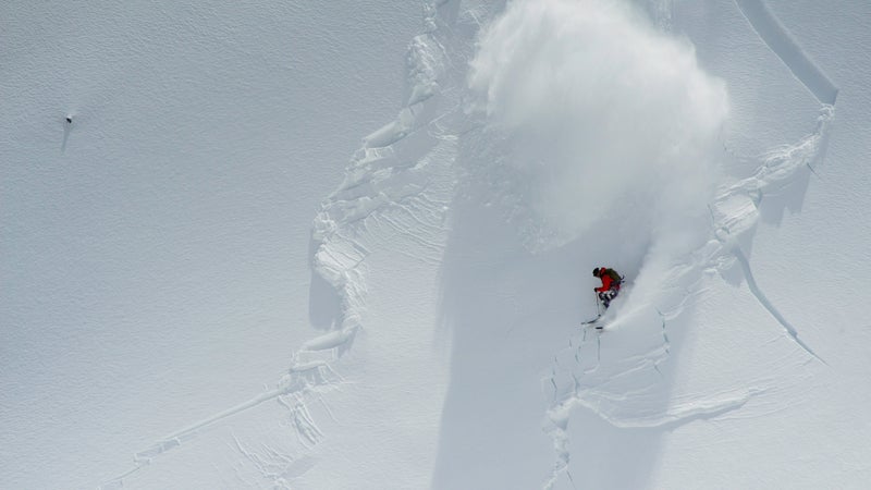 A professional skier setting off a one-foot-deep slab on Mount Baker, in Washington