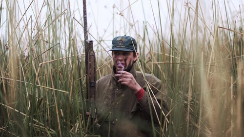 During a winter break from school last year, I put 4,000 miles on my car in 20 days. Most of these treks were to meet friends across the country to hunt ducks. Here, a cigarette break after an early morning.