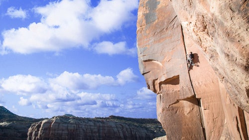 While most of us were waiting in airport security and Thanksgiving traffic, a couple hundred climbers were heading south to Indian Creek, Utah. The Creek, 40 miles south of Moab, is a crack-climbing mecca, chock-full of legendary routes for those willing to suffer.
For the past decade or so, Thanksgiving has brought those masochists out in force, coming together to bloody their knuckles on gritty sandstone and split pumpkin pies pulled out of dumpsters. The gathering, informally dubbed Creeksgiving, is a last hurrah of sorts, a chance to climb a few more pitches in the sun before trading climbing shoes for ski boots鈥攐r at least crampons.
Bozeman-based photographer and climber Seth Langbauer was back this year for his third Creeksgiving, drawn to the red rock desert to log one last week of climbing before the snow started to fly. 鈥淭here鈥檚 no service, so there鈥檚 this whole little beatnik climbing community communicating through notes left at message boards,鈥 he said. 鈥淓veryone鈥檚 down there for the same reason: to hang out in the sun and climb cracks.鈥
Photo: Crack climbing is just what it sounds like: Climbers use special techniques to follow fissures up a wall. Indian Creek is home to a range of crack sizes, from those just big enough for a fingertip to chimneys wide enough to crawl inside and shimmy up. Looking for a break from hand cracks, climber Jake Woodland, who鈥檚 been living in his car while traveling from crag to crag, jumped into the wide crack of Big Baby. To inch up the 5.11 route, Woodland had to wedge entire limbs into the crack, topping out with bloody knees and elbows. Said Langbauer, 鈥淪horts were a bad choice.鈥