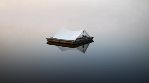 My family has been going to this small lake is East Texas for years. The water typically stays glassy like this still until 10 or 11 a.m. and on this day in May, the fog was heavy. I drove to Walmart the night before, bought a king size bed sheet for $4.96, and made this shelter the next morning. I planned on sleeping out there, but the fog quickly drenched my sleeping bags.