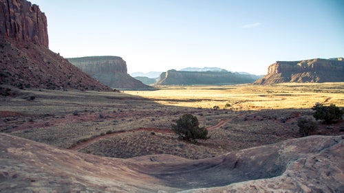 It鈥檚 hard to beat the morning commute in the Creek. Along the dirt roads to that morning鈥檚 crag, the sun hit the red-rock desert, turning it gold.