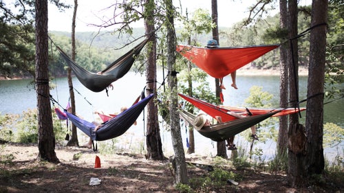 Just two months after I bought my first full-frame camera, a group of ten high school friends from Dallas took a four day camping trip in Northern Arkansas. After attempting to evade rangers in a state park near Lake Ouachita, we were quickly caught, told to leave, and find a designated campsite. No fun. The man who owned a marina near by, offered to take us and all equipment necessary to an island in the middle of this 40,000 acre lake. We were eager and hopped on board, but the pontoon boat began tilting and taking on water. Coolers and bags went floating, but soon we were at the location of this image, relaxing for the next two days.