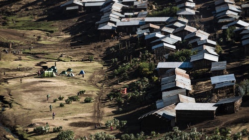 Homes in Arkwasiye, the valley town we camped beside on night five, were some of the nicest we encountered, with walls of eucalyptus and mud beneath corrugated-tin roofs. The structures were like new; the town was relocated here three years ago because its previous site interfered with migration patterns of ibex, bush buck, and Ethiopian wolves.