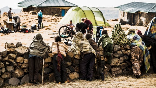 At Aynameda Camp—three stone buildings on a rubbly plain—we had our first sensation of feeling a bit like zoo animals on display as locals gathered from nearby villages to watch us build bikes. Only twice before had outsiders brought mountain bikes to these hills, we were told, so we were a fairly novel spectacle.